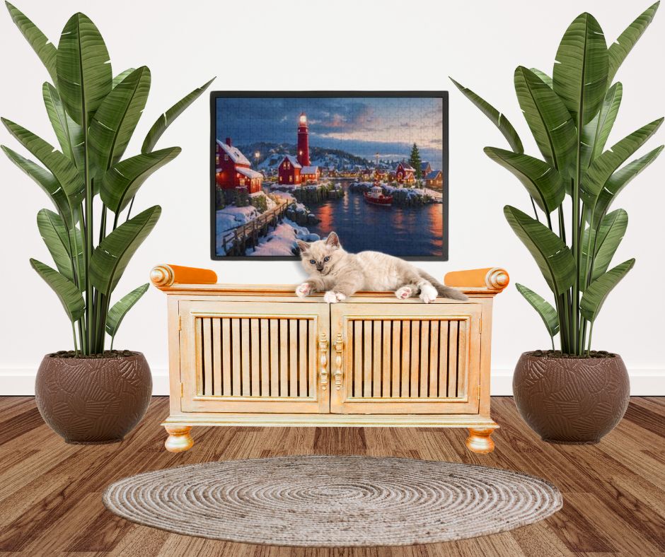 Charming Winter Evening Jigsaw Puzzle, a snowy villiage in a cove on the sea shore. It's dusk and the lights in the home cast a cozy glow on the water's edge. ahomespunhobby.com.